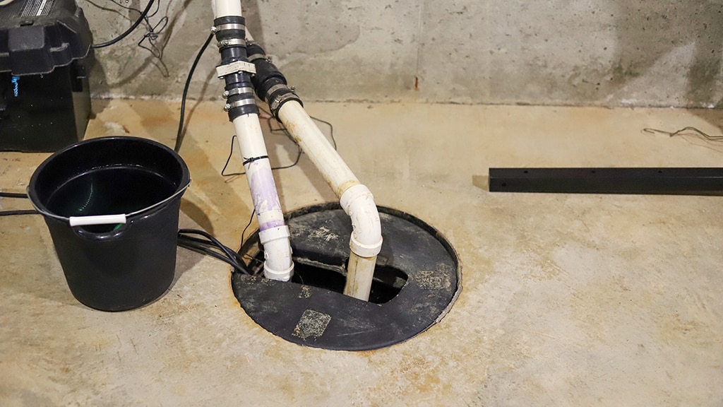 A sump pump in a  home basement